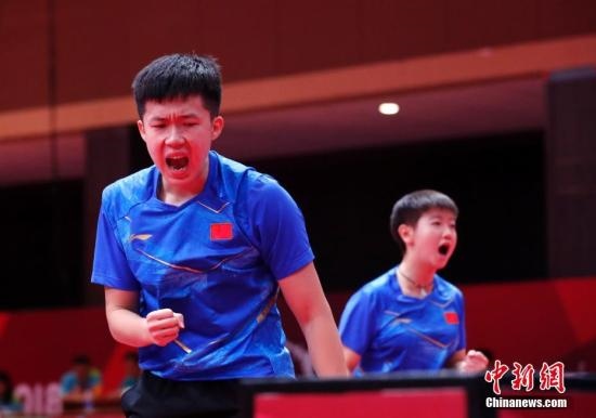 資料圖：雅加達(dá)亞運(yùn)會(huì)，王楚欽/孫穎莎奪得混雙冠軍。 <a target='_blank' href='/'>中新社</a>記者 劉關(guān)關(guān) 攝