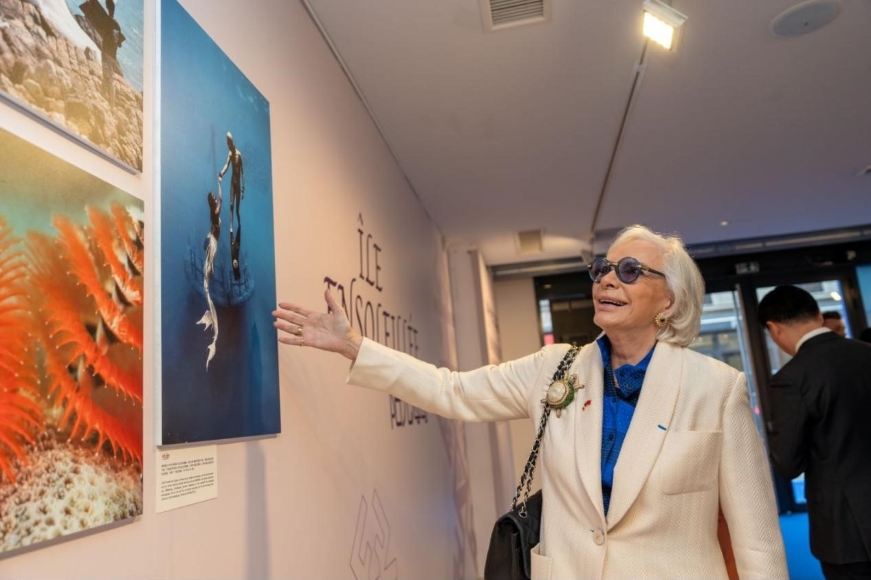 世界旅游組織特別顧問瑪麗-皮埃爾·布歇-奧利耶觀看活動現(xiàn)場圖片展覽?；顒又鬓k方供圖